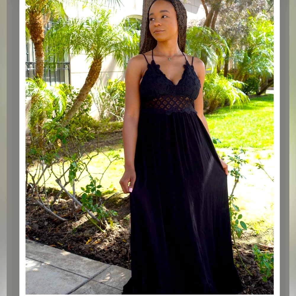 This is NWOT CHARLOTTERUSSE m macramé at the top and a beautiful long sundress